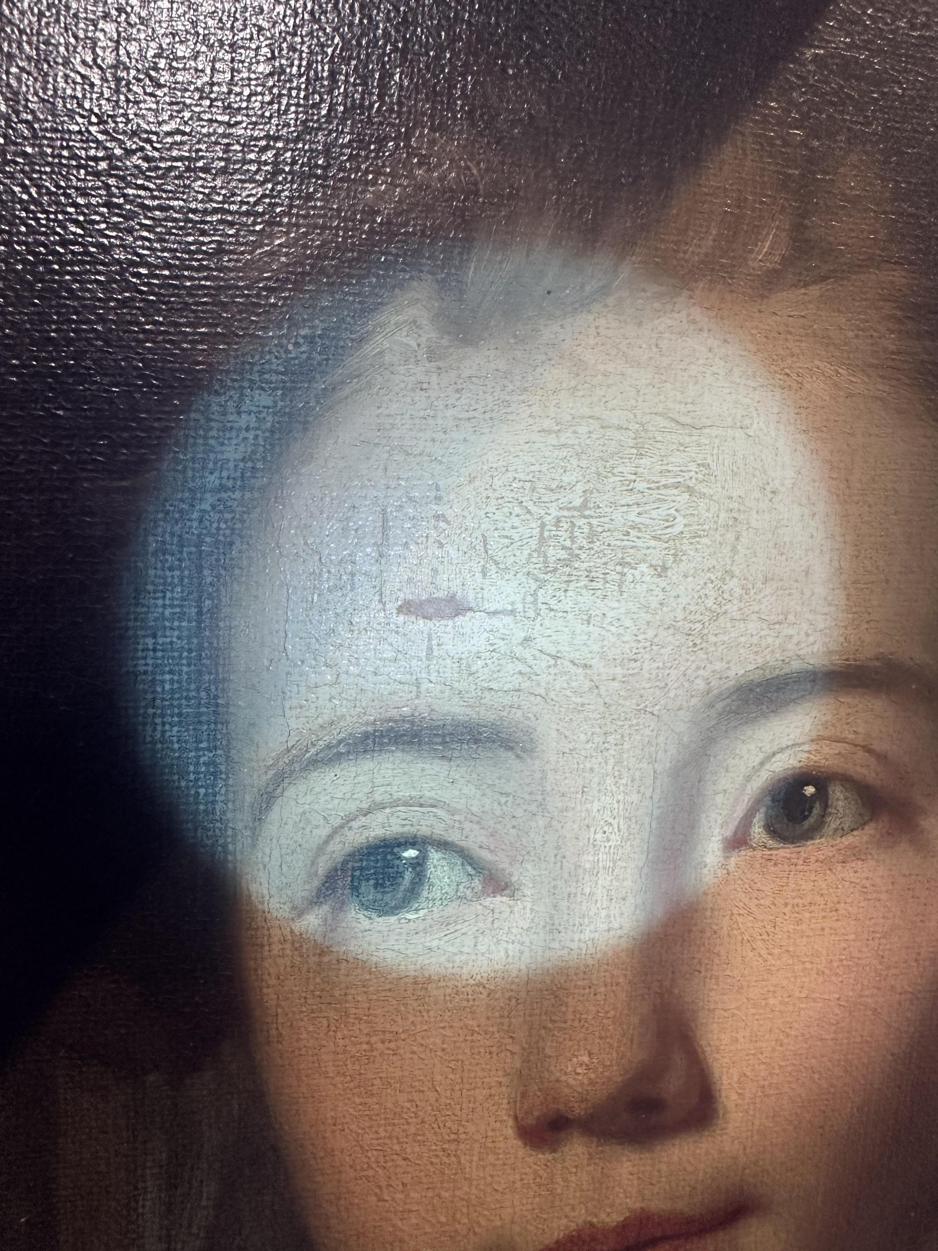 Follower of George Romney, British 1734-1802, A portrait of a young lady with yellow drapery